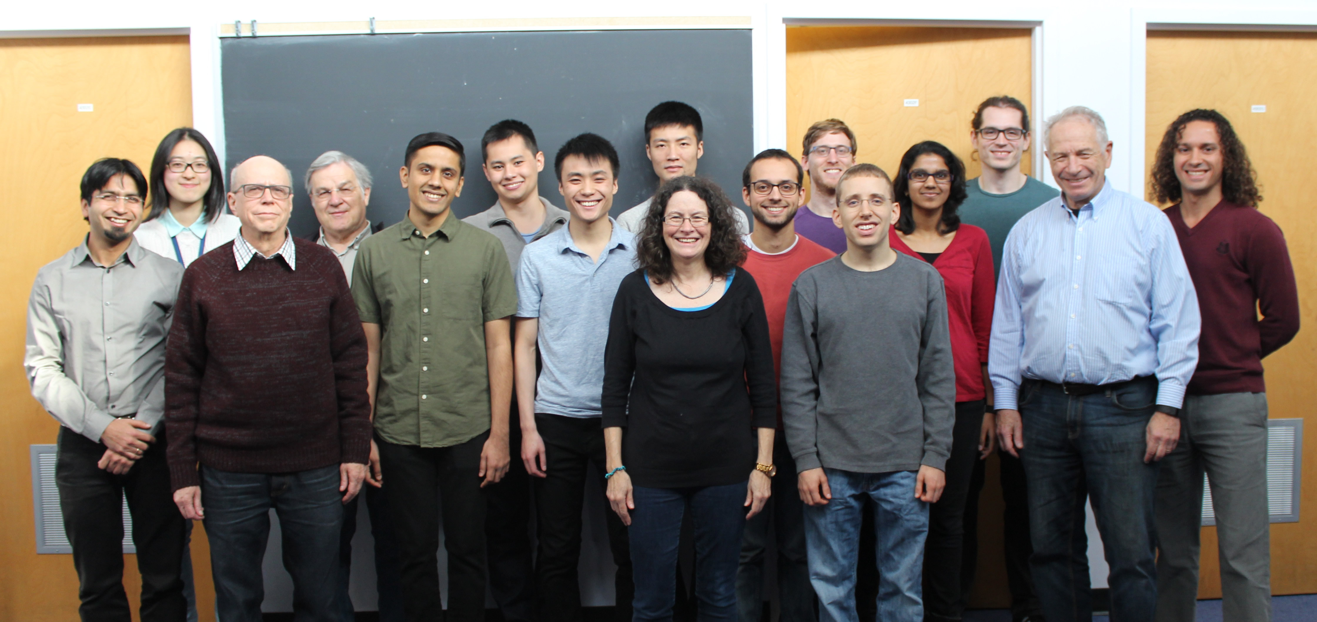 An archival group photograph of Toronto theory researchers