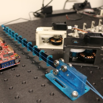 Planar tendon-driven continuum robot